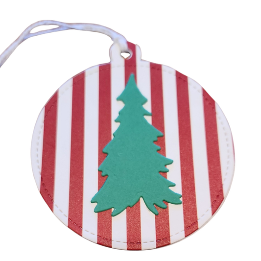 Set of six handmade round Christmas gift tags featuring red-and-white stripes, dimensional green Christmas trees, and white hanging cords.